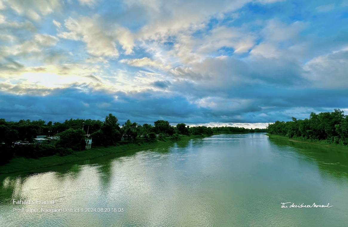 Beautiful landscape of a wide river under dramatic clouds